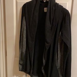 Sweater/Cardigan with hood and sparkle detail.